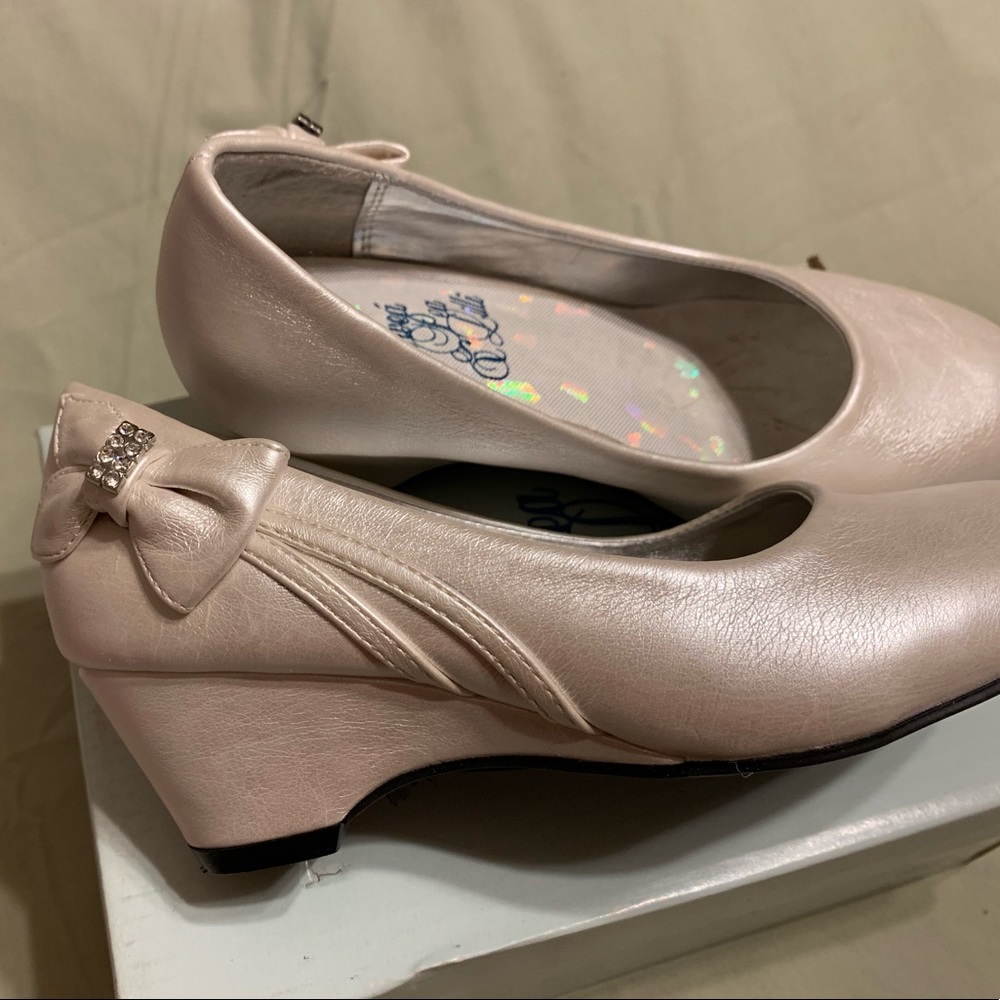 Little girls ivory wedge dress shoe.